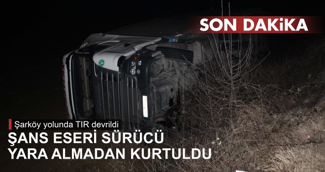TIR ŞARAMPOLE DEVRİLDİ